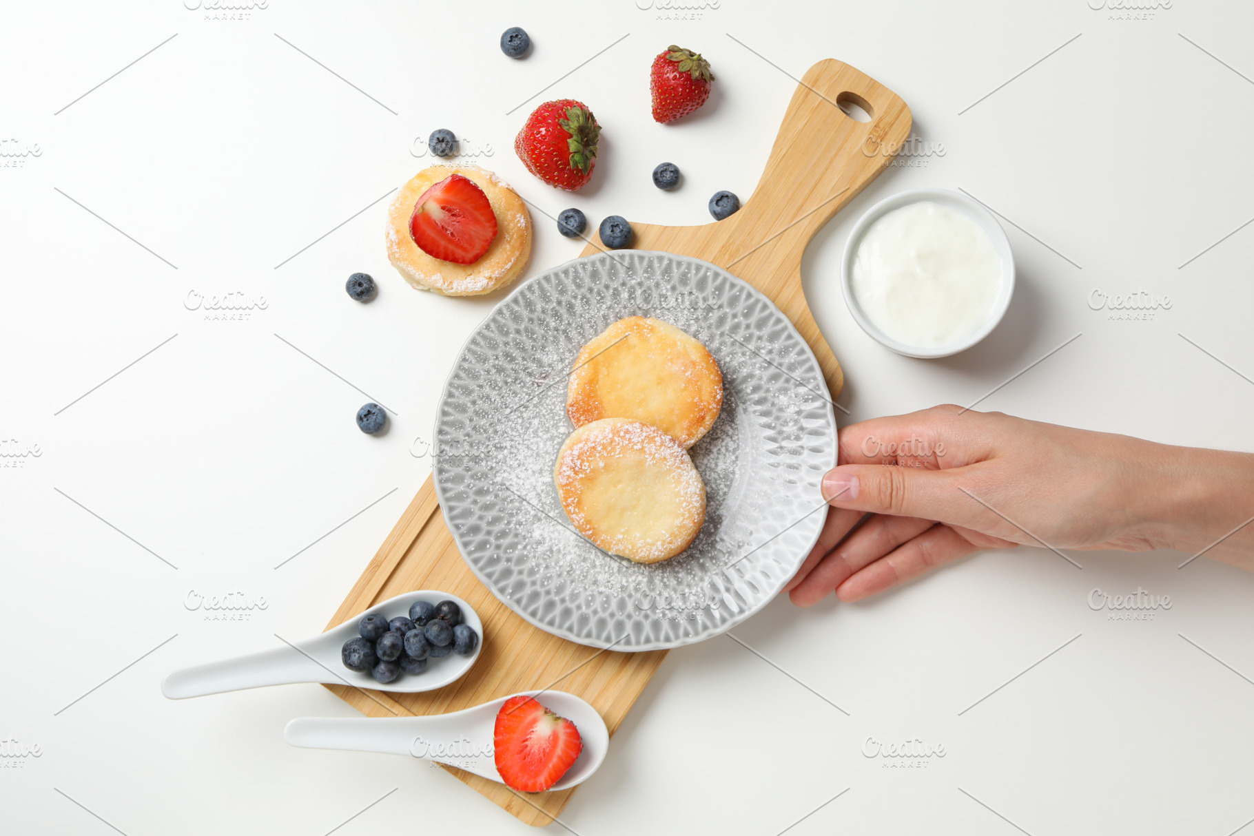 Concept of tasty sweet food, cheese pancakes, top view, a Food & Drink Photo by AtlasStudio PRO
