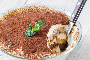 Close up tiramisu dessert, a Food & Drink Photo by Alexander Prokopenko