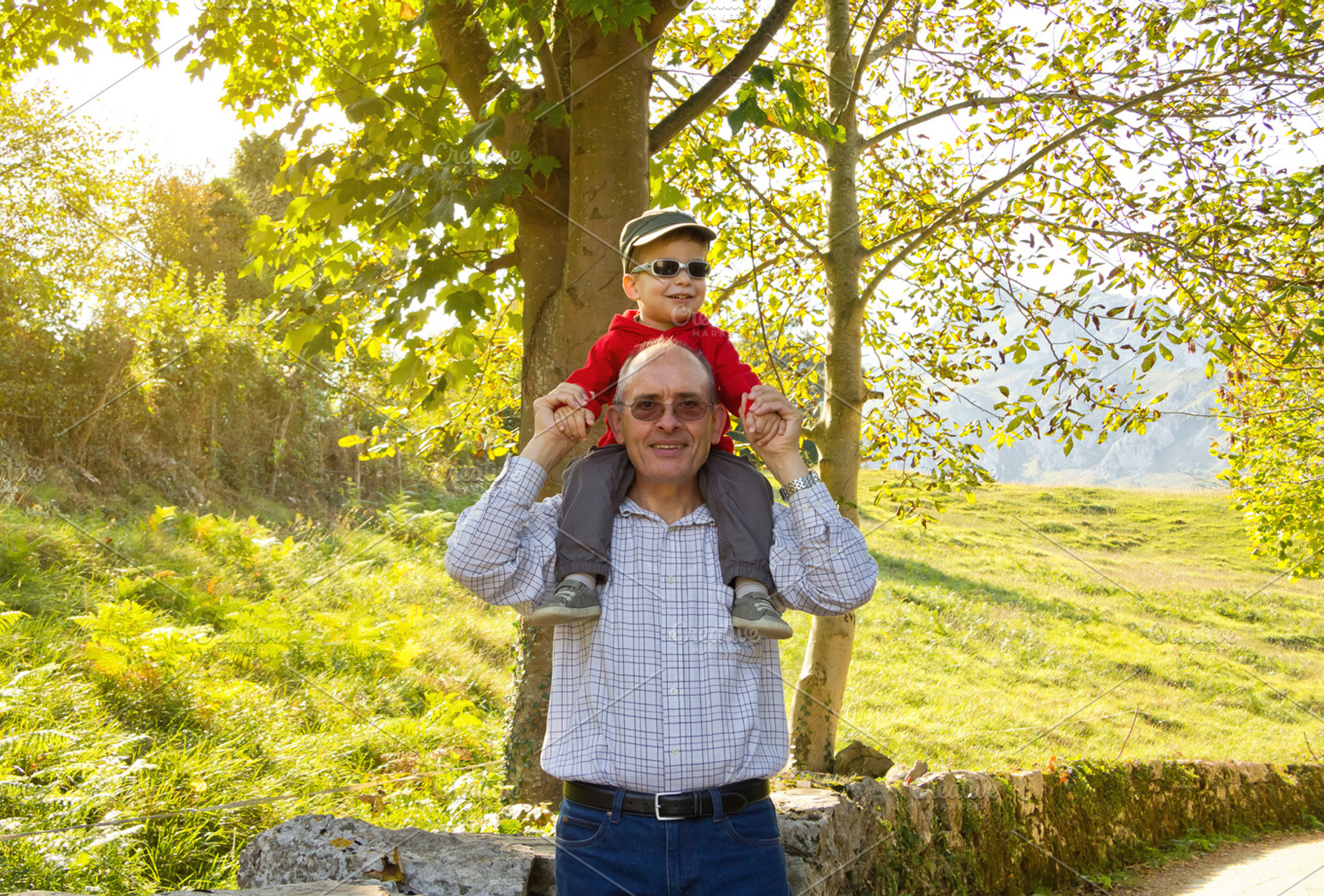 Grandfather holding grandchild