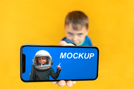 Child holding a Phone