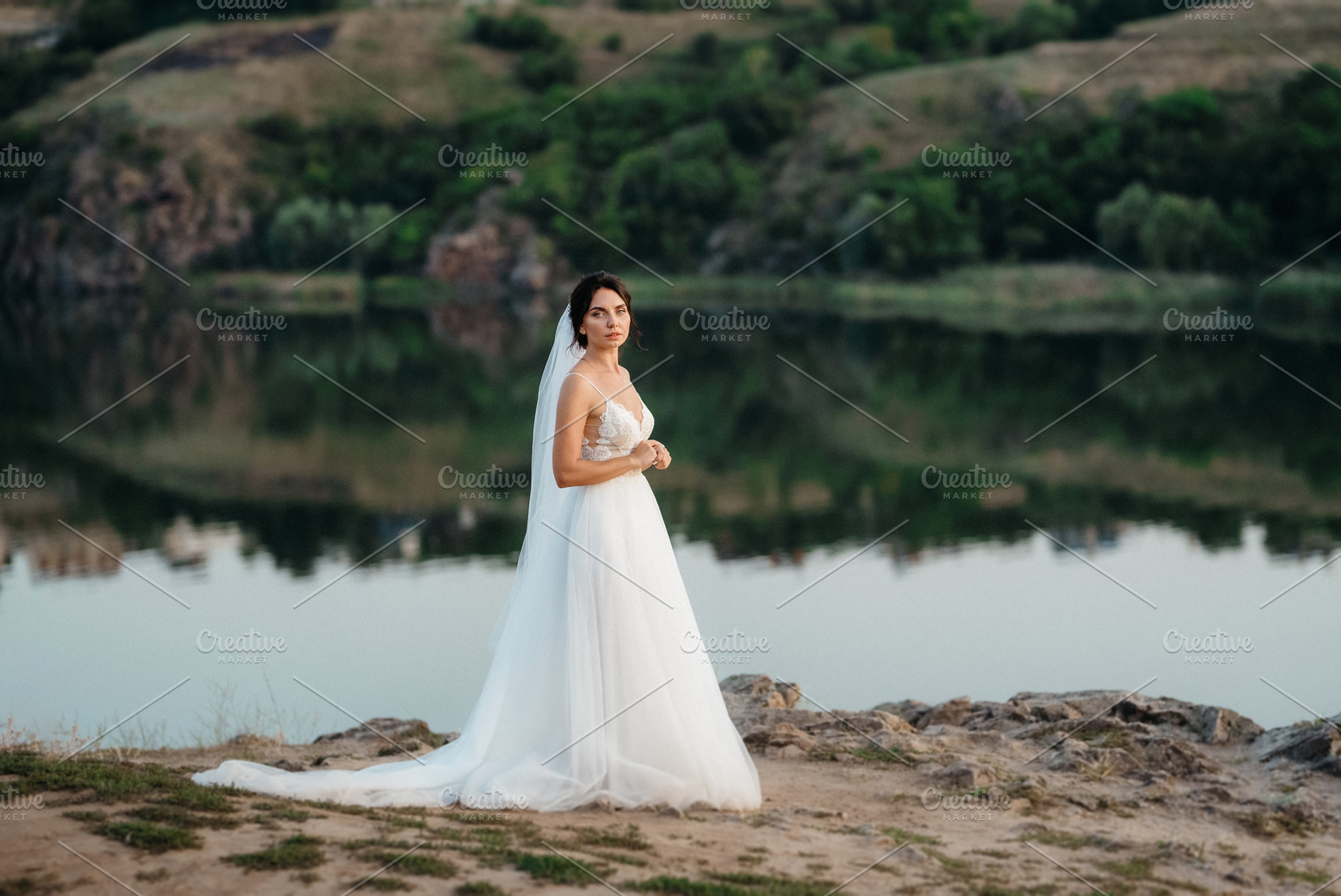 bride blonde girl with a bouquet in the forest, a Person Photo by Weddings, People, Travel