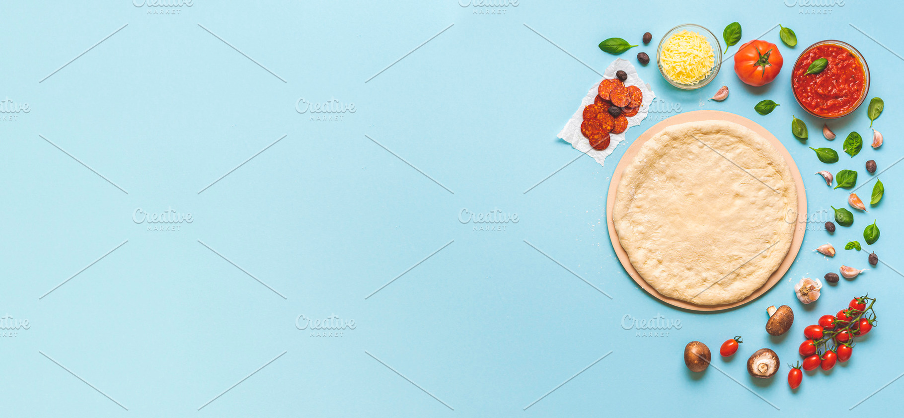 Pizza dough and ingredients top view, a Food & Drink Photo by YesPhotographers