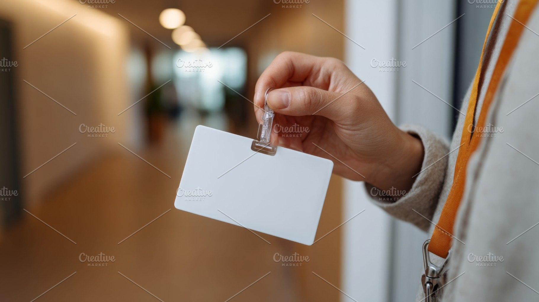 A close-up of a hand holding a blank identification badge, emphasizing the impo, a Business Photo by ImageMir