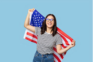 Smiling Latina woman in eyeglasses, a Person Photo by AD Stock Images