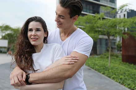 Man and woman couple smiling confident hugging each other at street, a Person Photo by RF Images