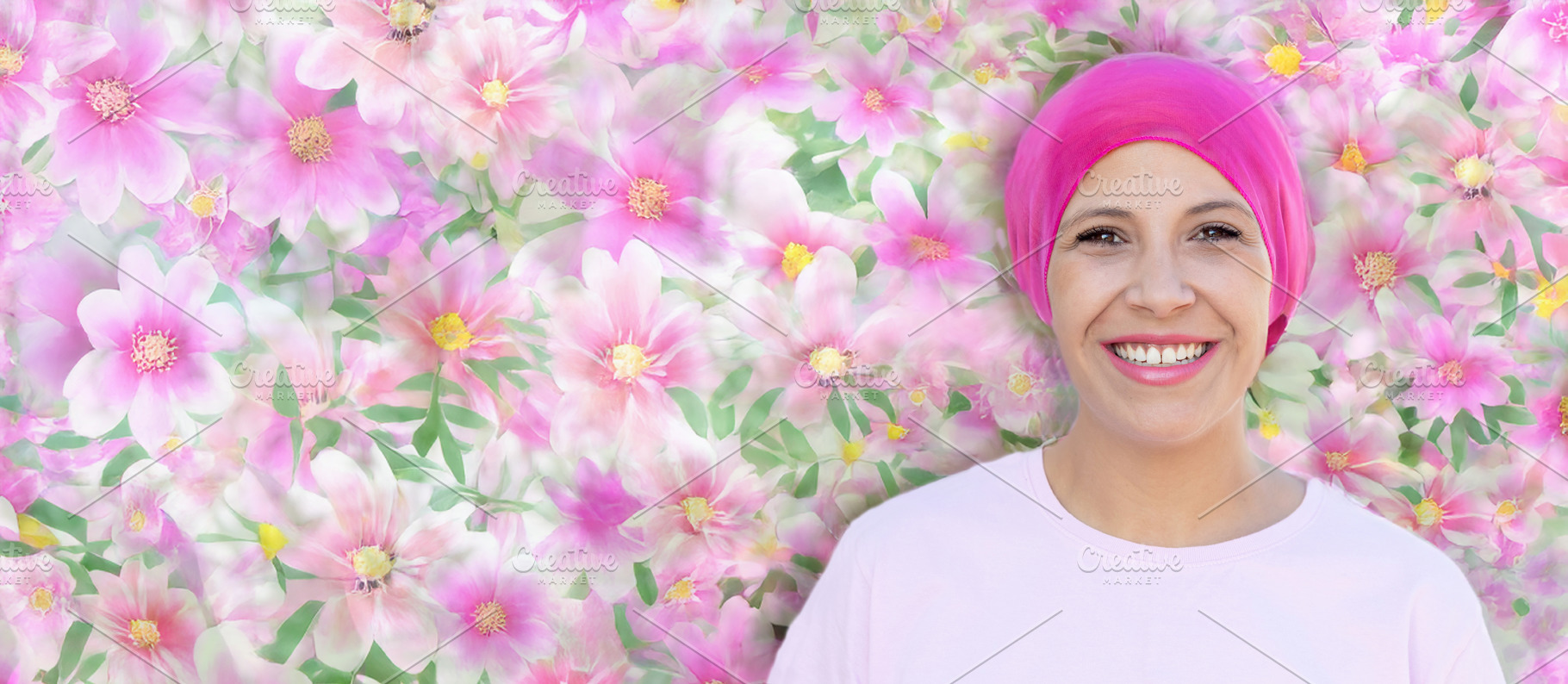 Smiling Breast Cancer Survivor in Pink Headscarf with Floral Bac, a Person Photo by José Manuel Gelpi