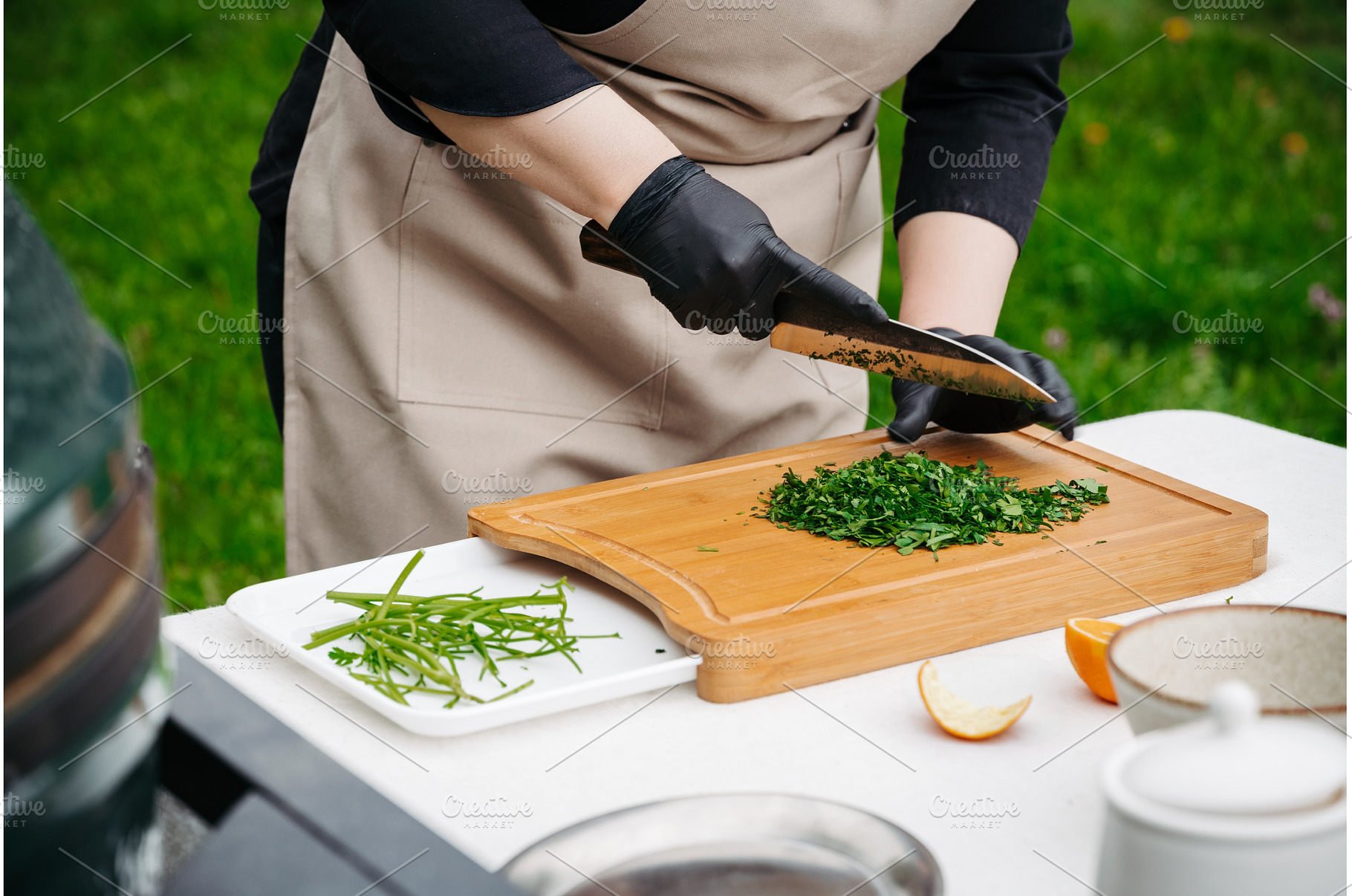 Chef preparing fresh chimichurri, a Food & Drink Photo by HalfPoint