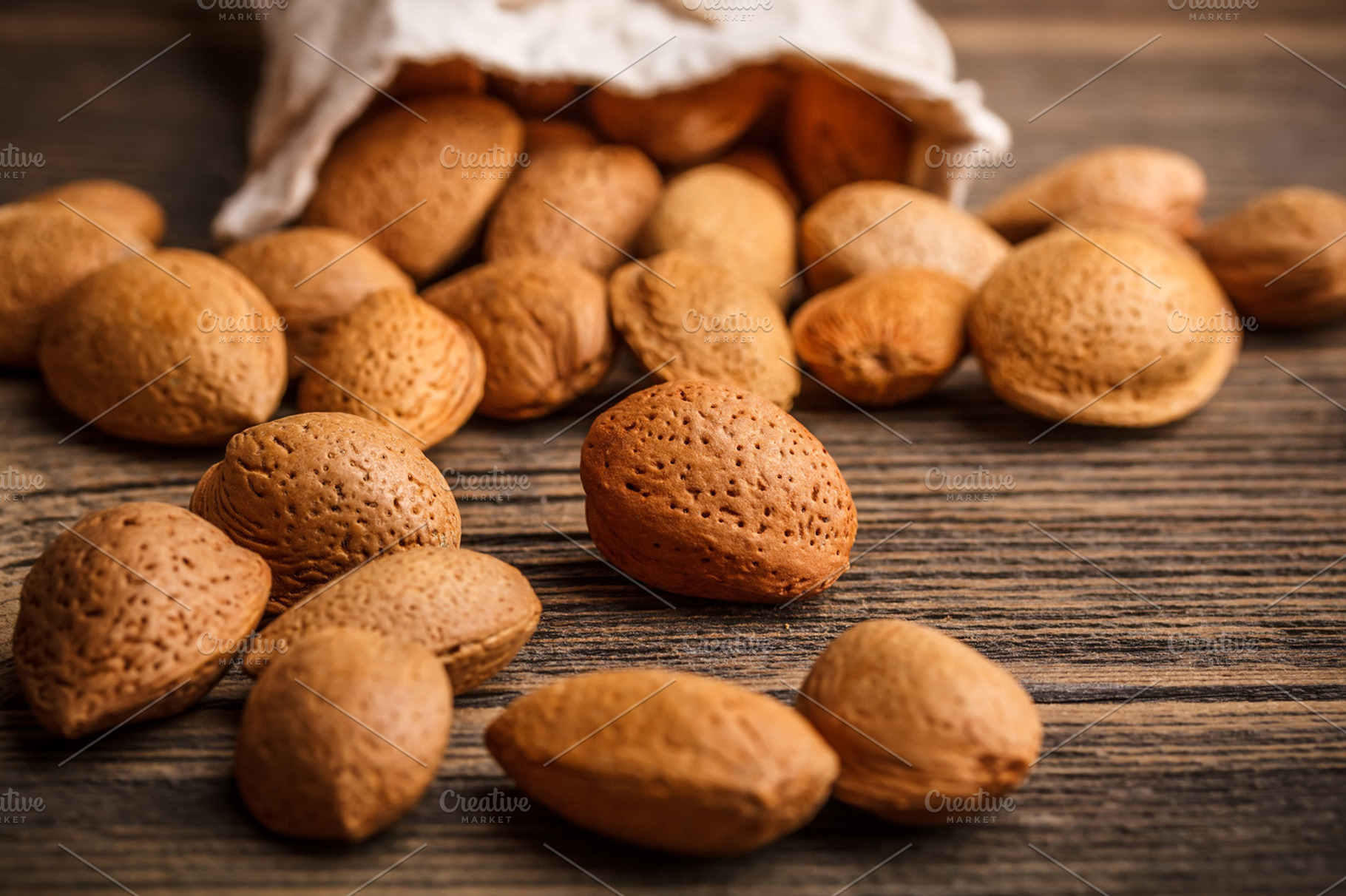 Almonds containing almonds, background, and bag