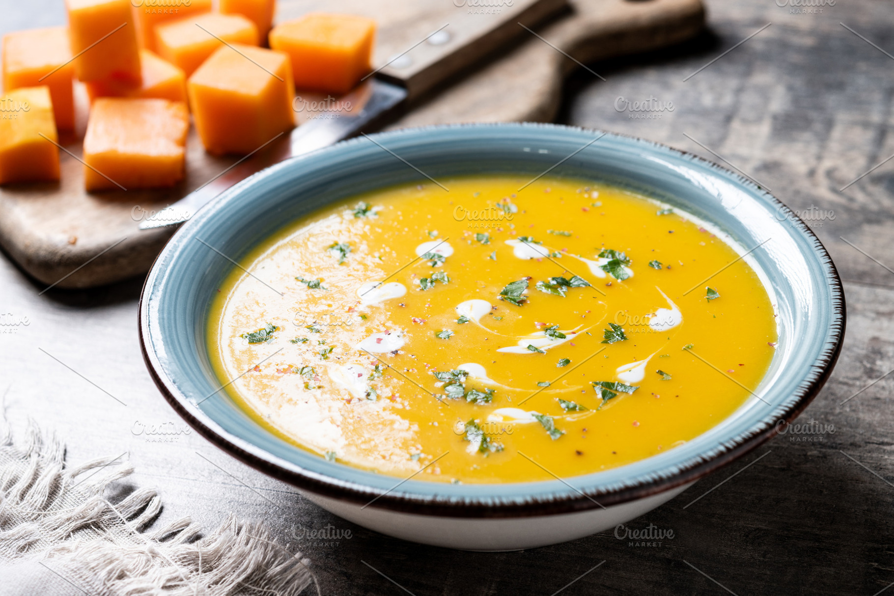 Creamy pumpkin soup with herbs and cream, a Food & Drink Photo by etorres69