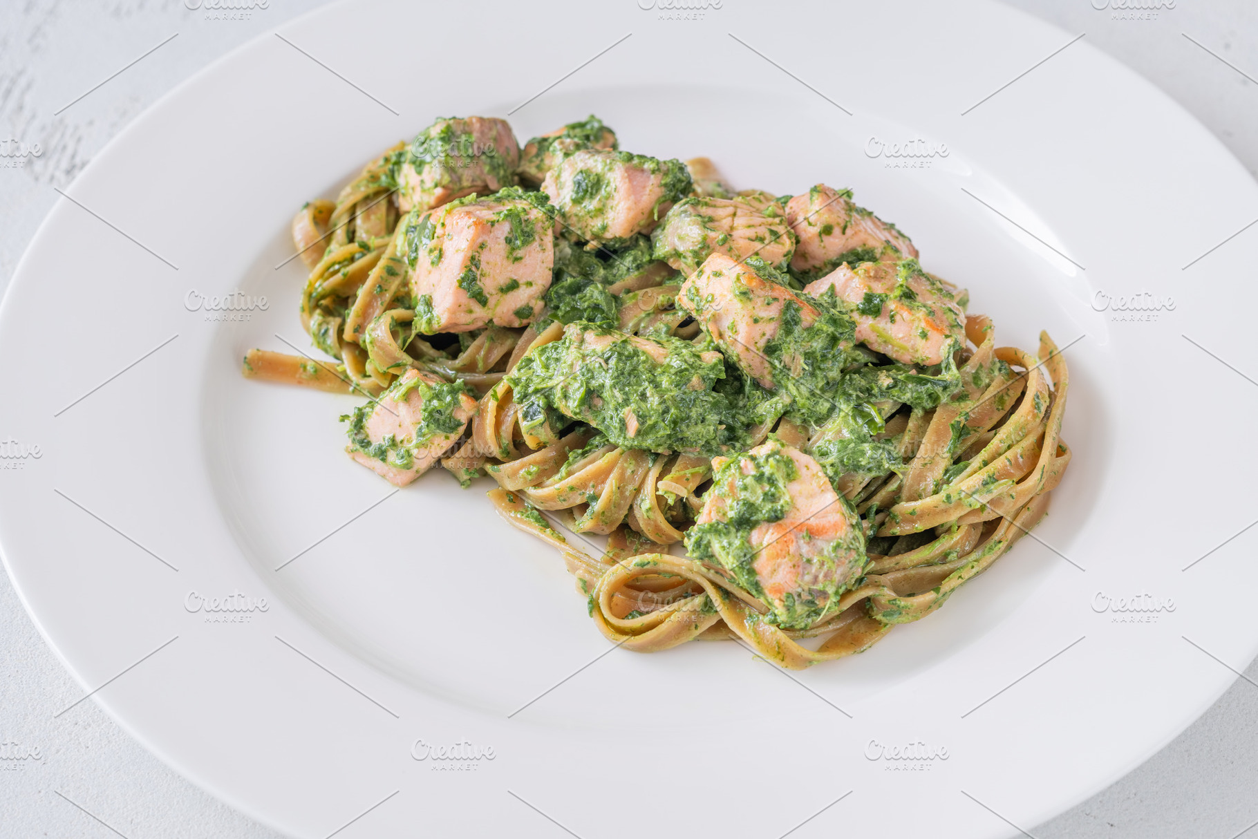 Salmon tagliatelle pasta, a Food & Drink Photo by Alexander Prokopenko