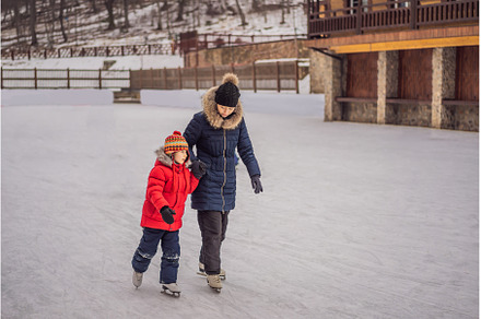 young mother teaching her little son, a Person Photo by Elizaveta Galitskaya