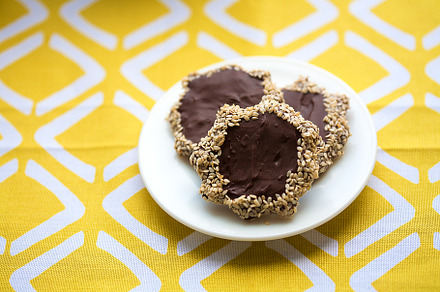 Homemade cookies with sesame seeds, chocolate, a Food & Drink Photo by Artsaba Family