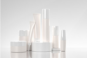 3D Cosmetics Bottles On Podium