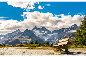 Bench at a scenic trail near Zermatt, a Nature Photo by Leonid Andronov
