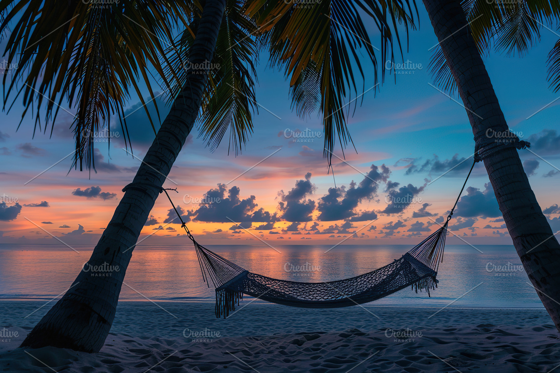 Beach hammock hanging between palm trees on sunset background, a Photo by AlyaAnd