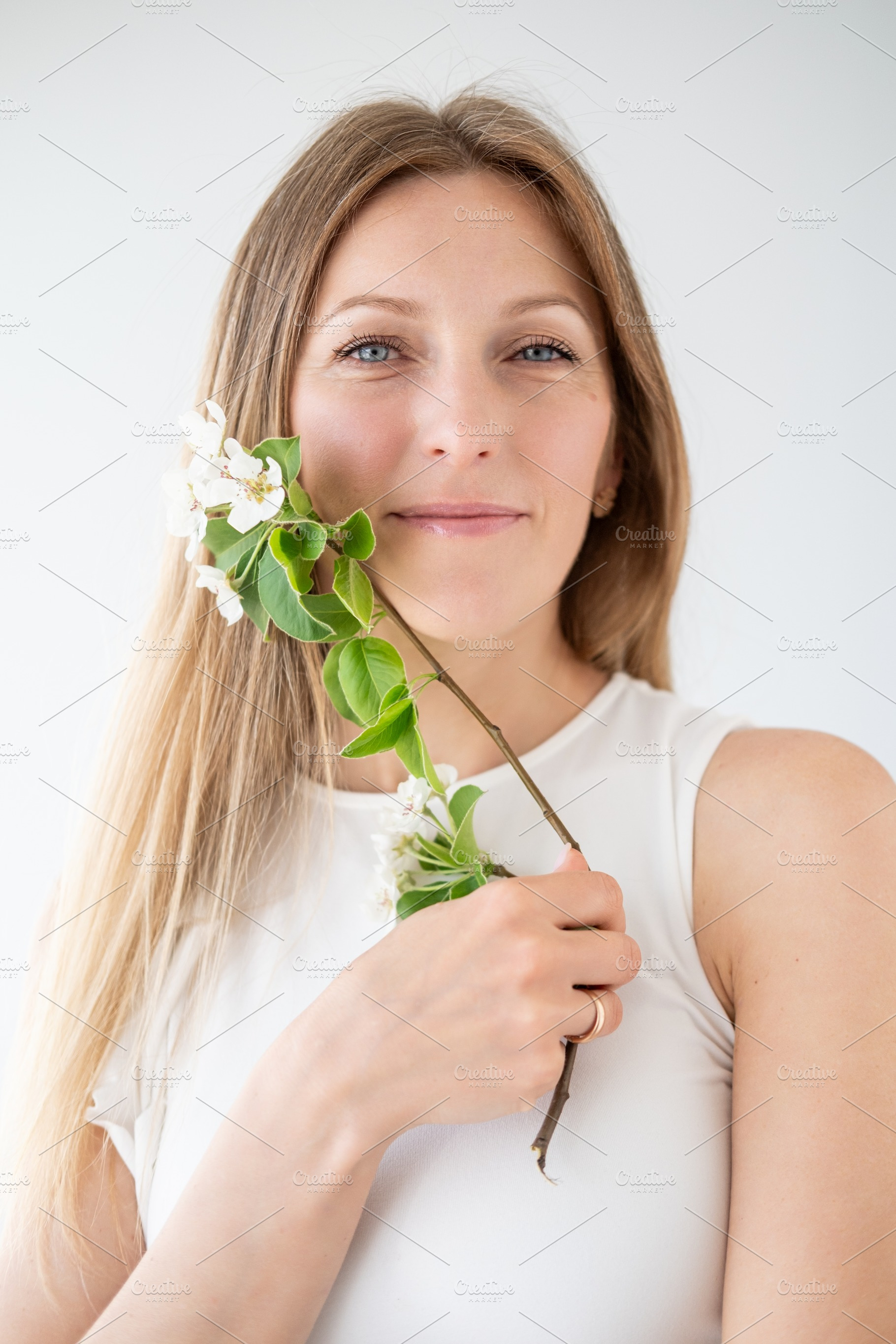 Natural beauty peace mood woman face green flower, a Person Photo by Photo Drive Studio