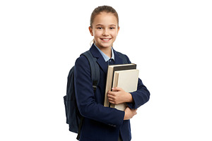 Girl Holds Books While Smiling, a School & Education Photo by CREATIVEDEF