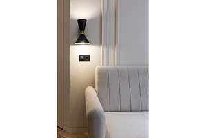 Black wall sconce lighting beside, an Architecture Photo by wip3out