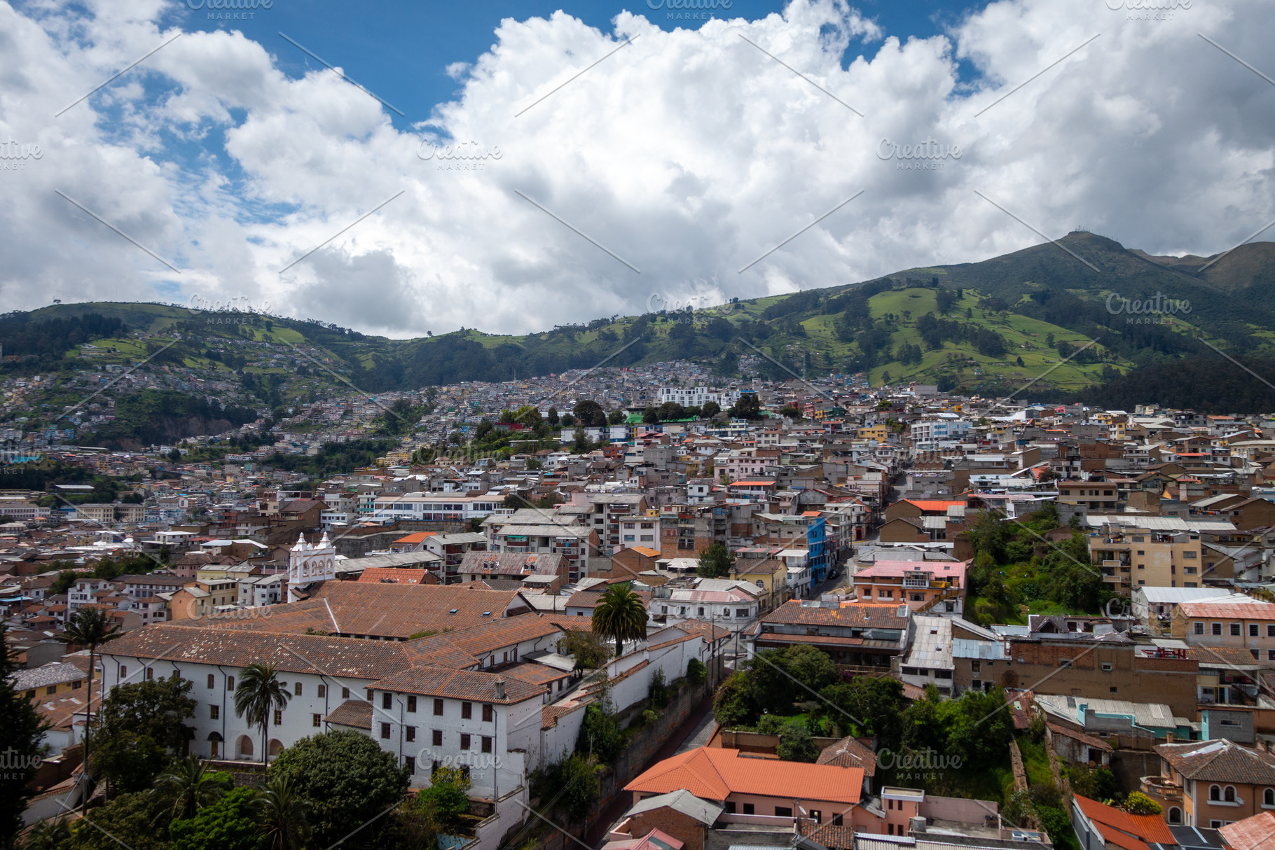 Aerial view of Quito city and surrounding hills in Ecuador, an Architecture Photo by GoodGoods