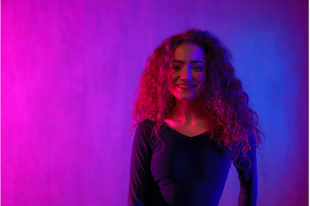 Portrait of a happy young woman, a Person Photo by HalfPoint
