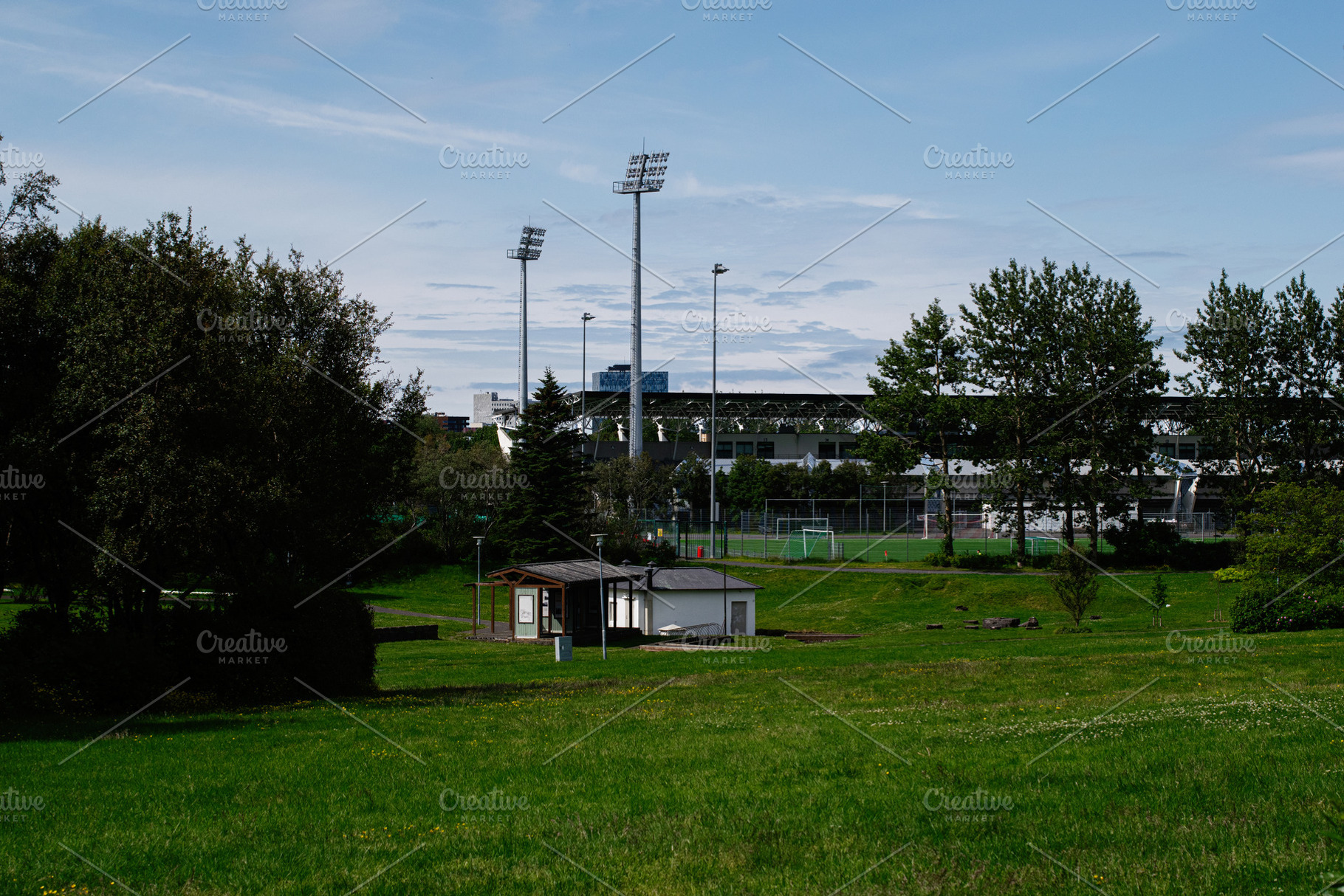 Scenic park and sports ground in Reykjavik, Iceland on a clear summer day, a Photo by AS photostudio