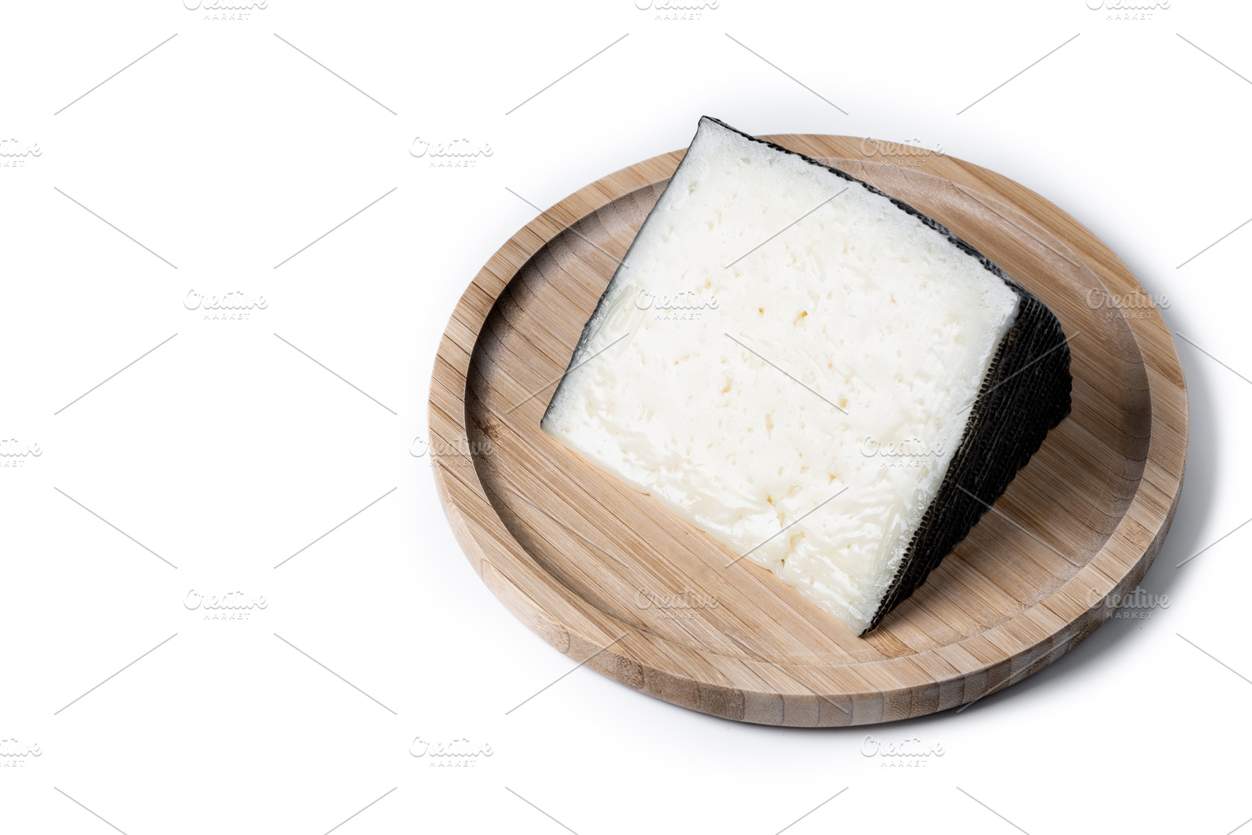 Close-up of a wedge of semi-cured cow's cheese, a Food & Drink Photo by etorres69