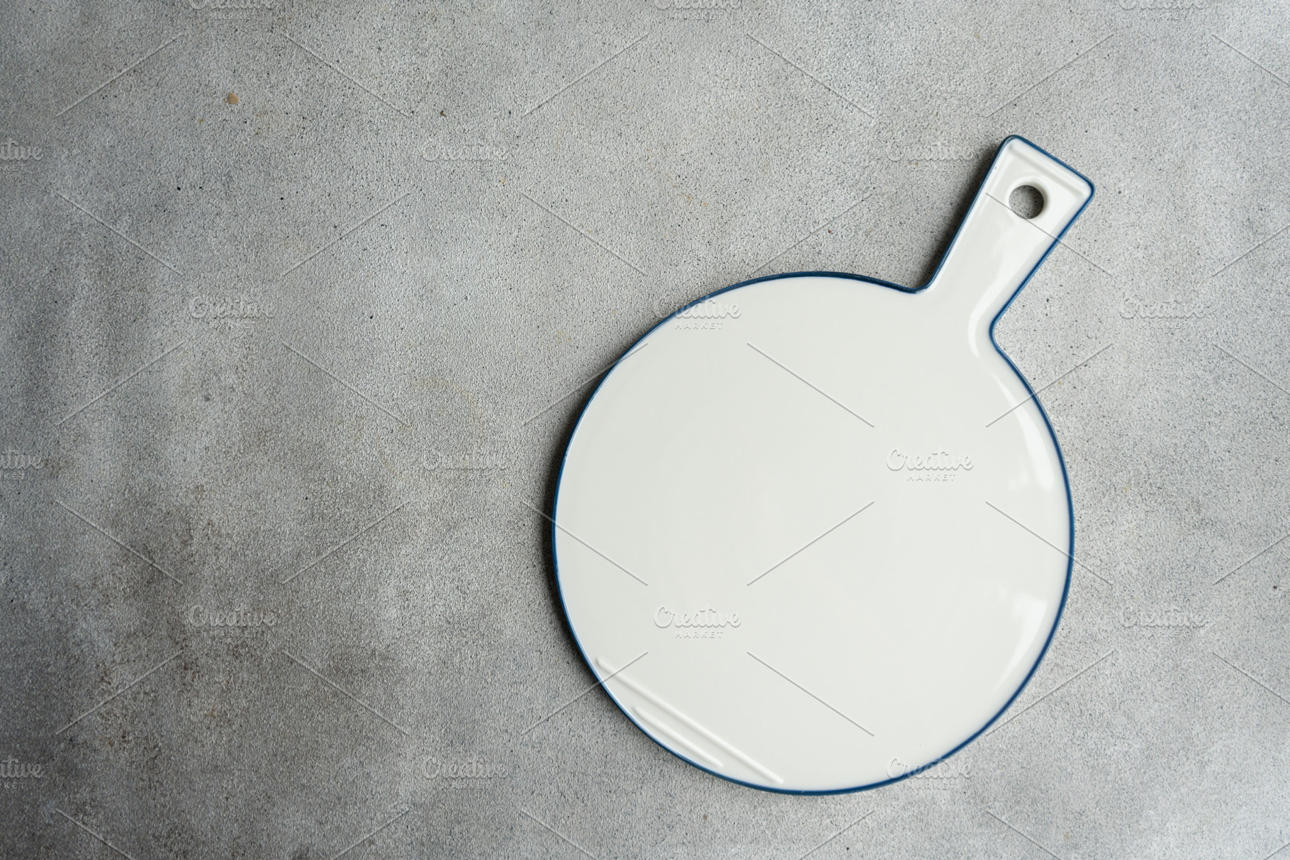 Cutting boards on concrete table background, a School & Education Photo by Anna Bogush