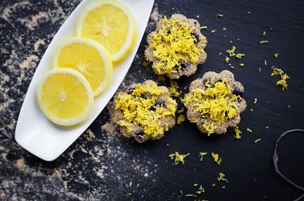 lemon cupcakes on a black background, a Food & Drink Photo by Artsaba Family