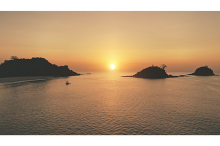 Sunset seascape of ocean bay at, a Nature Photo by Goinyk