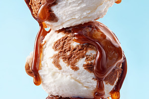 Stacked ice cream scoops with caramel drizzle, a Food & Drink Photo by AlyaAnd