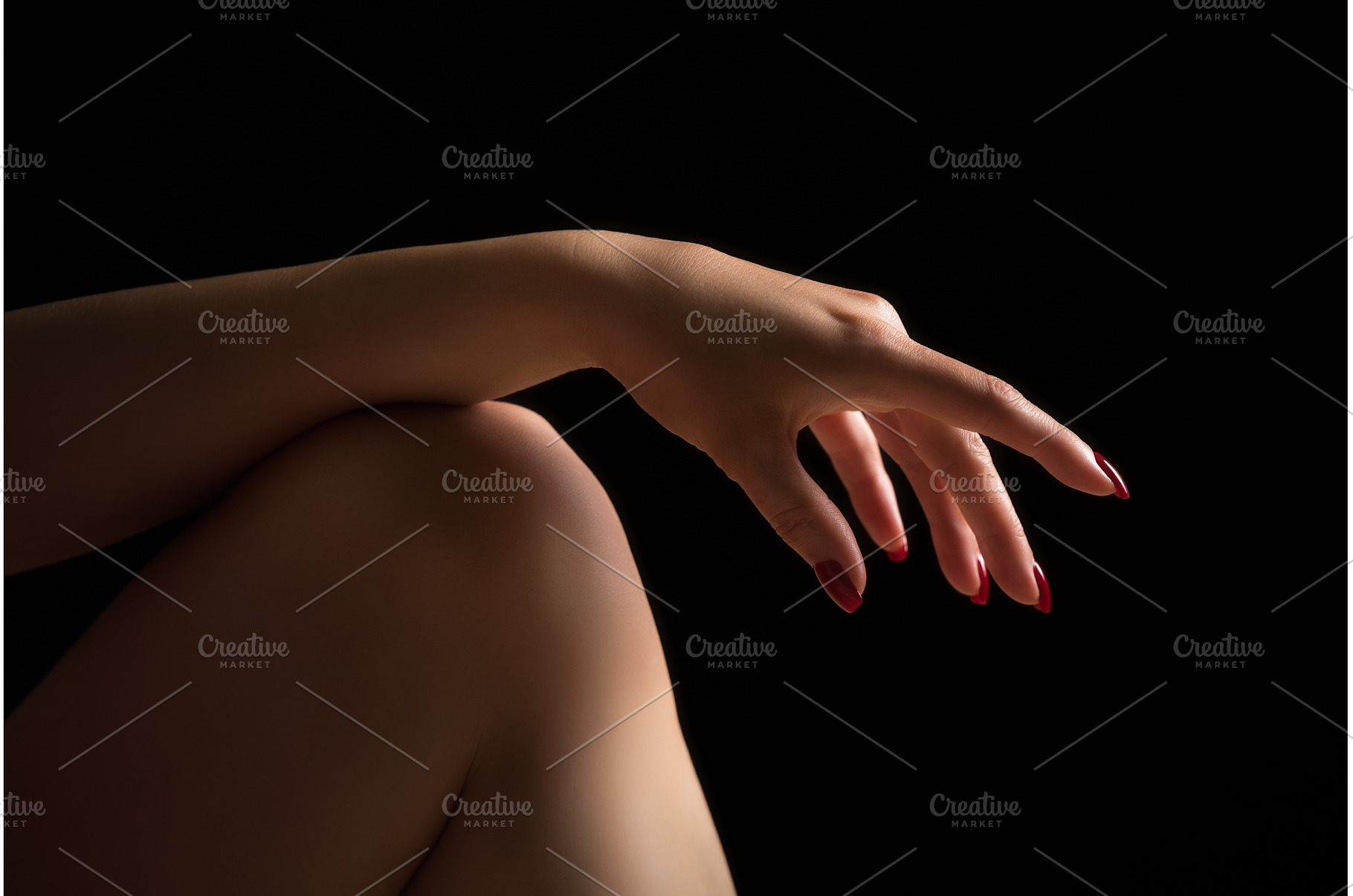Woman's hand lies relaxed on bare, a Health & Medical Photo by Alexander-Piragis