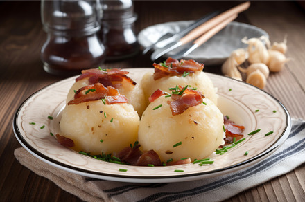 Traditional polish potato dumplings, a Food & Drink Photo by Ylivdesign