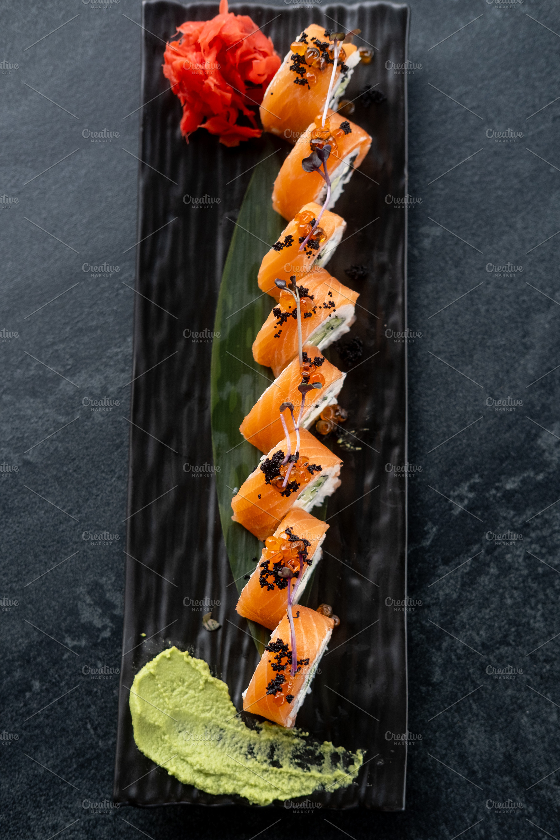 Sushi plate asian cuisine roll salmon wasabi black, a Food & Drink Photo by Photo Drive Studio