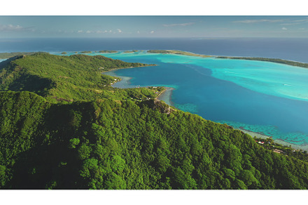 Lush tropical island coastline, a Nature Photo by Goinyk