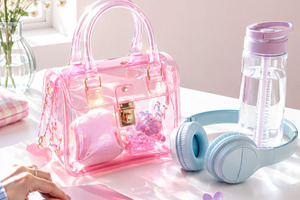 Transparent jelly handbag with Y2K f, a Photo by Dvoevnore photos