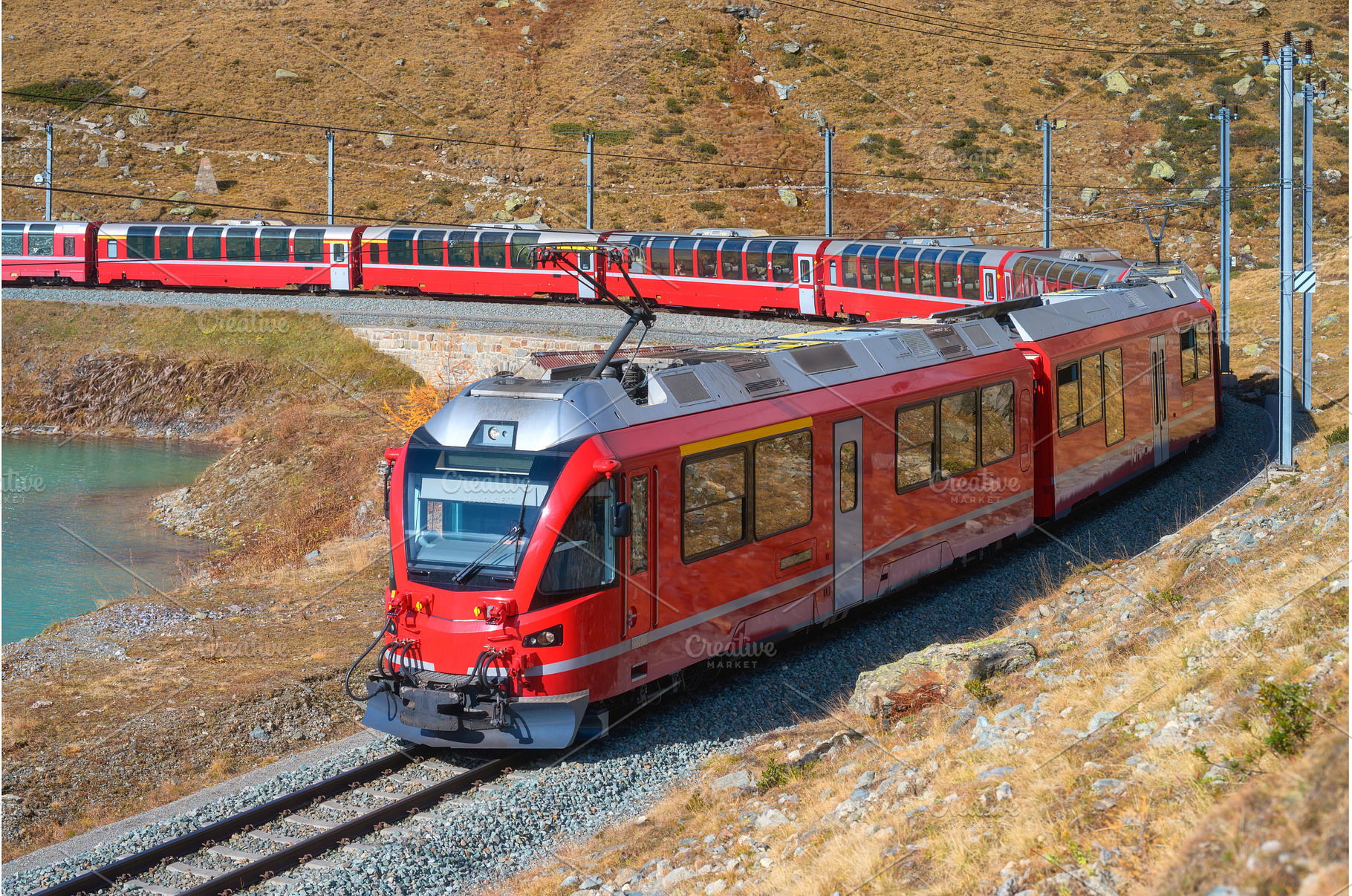 Red modern train is moving in swiss, a Transportation Photo by den-belitsky