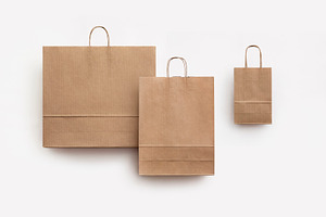 set of three brown kraft paper bags, a Beauty & Fashion Photo by UN-BRANDED