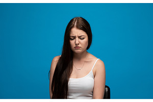 Young woman showing disappointment, a Person Photo by volodymyrshtun13795