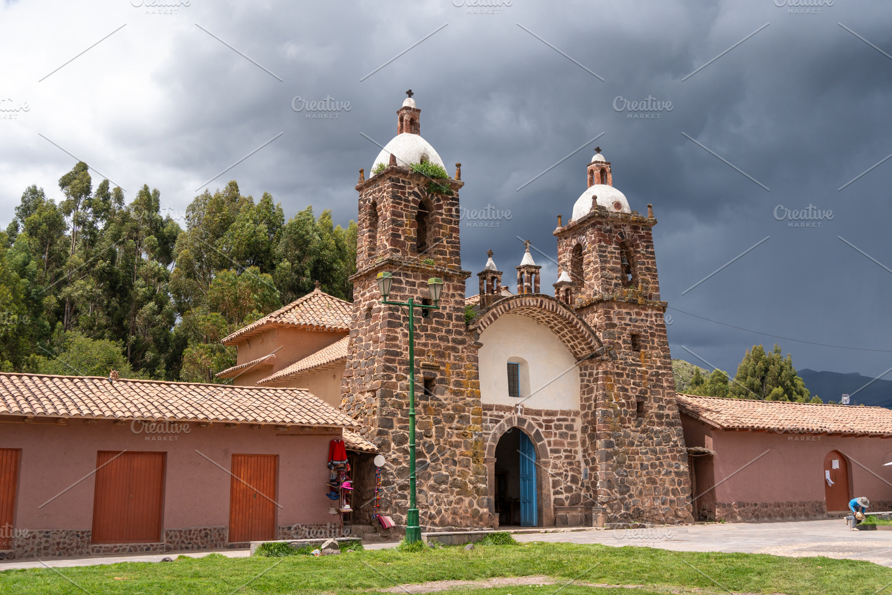 Historic Church of Raqchi Under a Stormy Sky in Peru, a Photo by GoodGoods