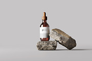 Amber Glass Dropper Bottle Mockup, a Cups & Container Mockup by pmvch (Thumbnail 4 of 6)