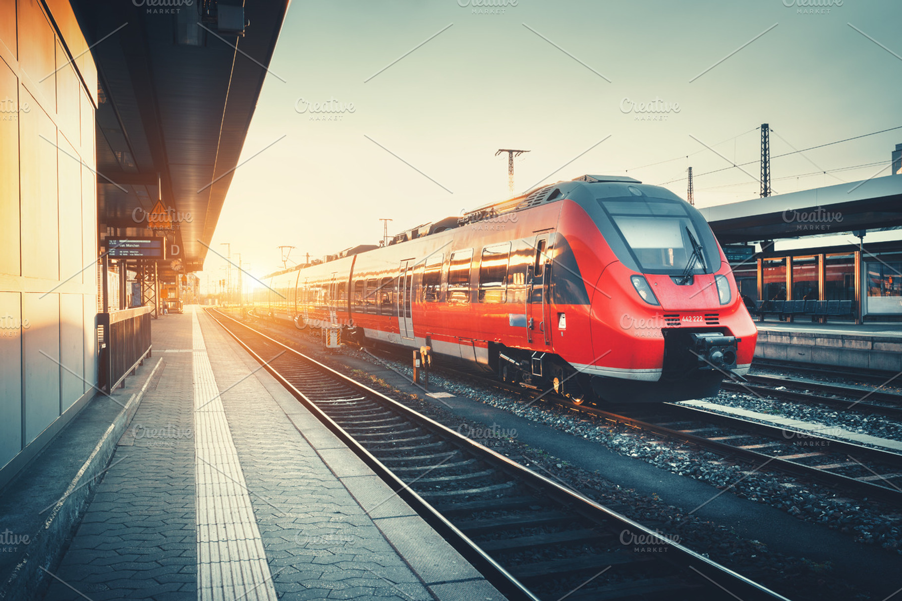 Beautiful modern red train at sunset, a Transportation Photo by den ...