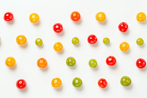 Assortment of colorful cherry tomato, a Photo by Pavel_design