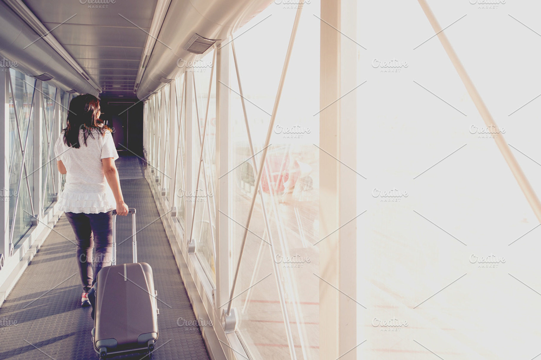Woman on a boarding bridge, a Transportation Photo by Nacroba
