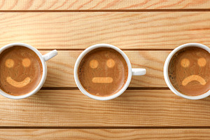 Collection of four coffee cups with various designs in foam, a Food & Drink Photo by Davizro's Market