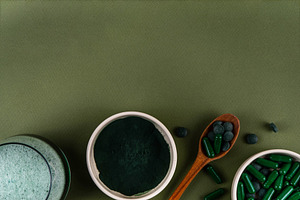 Spirulina in powder, capsules and tablets with spirulina smoothi, a Health & Medical Photo by Rimma