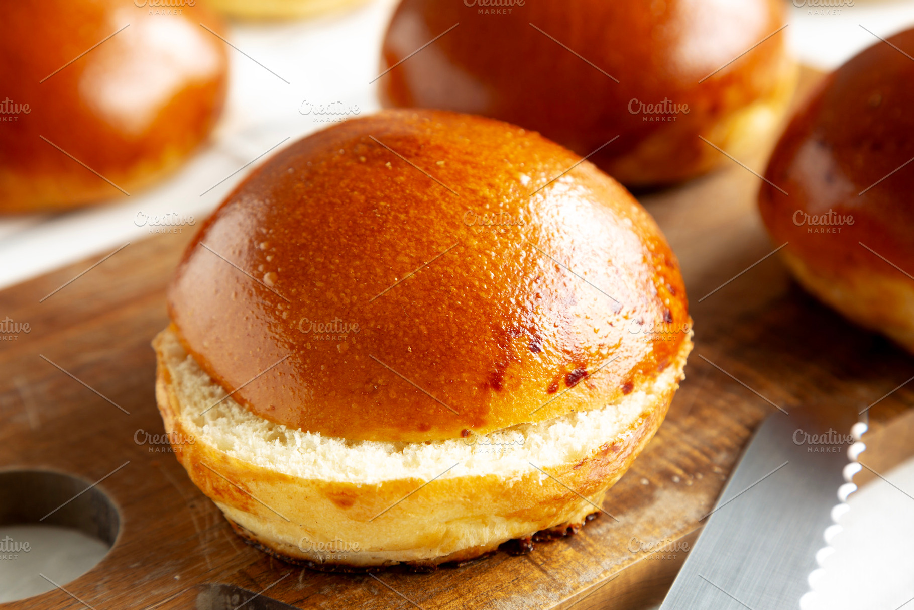Homemade Brioche Buns Ready to Eat, side view. Close-up., a Food & Drink Photo by LiudmylaChuhunova