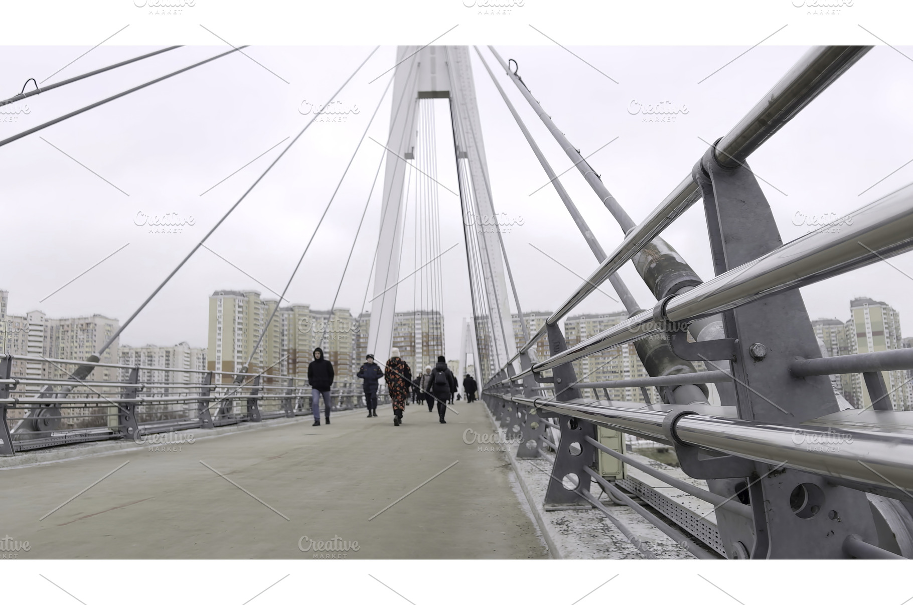 People walking on modern cable, an Architecture Photo by Media Whale Stock