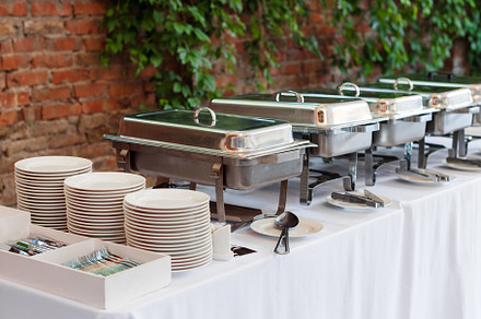 Buffet heated trays standing in line