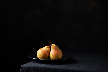 Fresh sweet pears on the dark background, a Food & Drink Photo by oxana.denezhkina