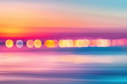 Shimmering sunset over tranquil sea, a Photo by Iftikhar Alam